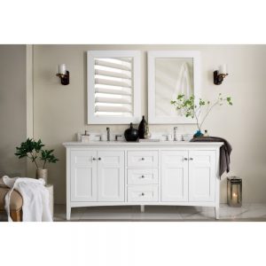 A modern bathroom features the Palisades 72-inch Double Bathroom Vanity in Bright White with double sinks, two mirrors, and wall-mounted lights. Decorated with plants, candles, and toiletries, the space maintains a clean and elegant look with its neutral color palette.