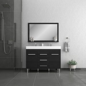 The modern bathroom displays a Ripley 48 Inch Double Bathroom Vanity With Sink in black, with six drawers and a white countertop featuring twin faucets. A large mirror is above, a gray-tiled shower is to the left with a towel ring holding a grey towel, and a small plant sits on the floor to the right.