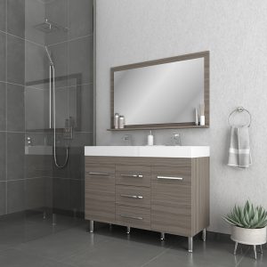 This modern bathroom includes the gray Ripley 48 Inch Double Bathroom Vanity With Sink, dual sinks, and a large mirror. A glass shower is on the left, while a potted plant near the towel ring enhances the minimalist decor on the right.