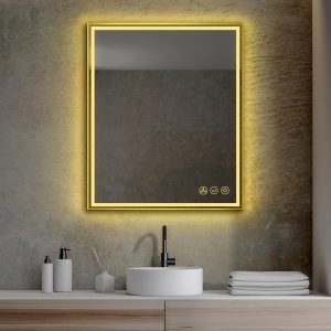 A modern bathroom showcases a Stellar 30 Inch LED Bathroom Mirror with a luminous gold frame set against a textured gray wall. Below, a white sink with a black faucet is flanked by soap dispensers and neatly folded towels.