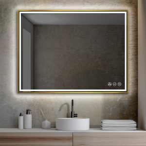 A modern bathroom showcases the Stellar 48 Inch LED Light Bathroom Mirror with a glowing border on a textured gray wall. Beneath it, theres a sleek white sink accompanied by a black faucet, soap dispenser, toothbrush holder, and neatly folded towels.