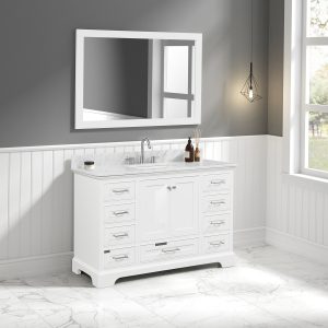 A modern bathroom features a Copenhagen 48 inch Bathroom Vanity Matte White with Carrara Marble Top and multiple drawers, enhanced by a large mirror. A geometric pendant light hangs above. White wainscoting and gray upper walls pair beautifully with the tiled floor.