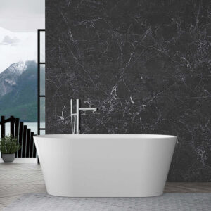 A modern bathroom features the Freestanding Soaking Bathtub Fiberglass, a sleek chrome faucet, a dark marble wall, and a large window with mountain and lake views. A plant sits to the left near the window.