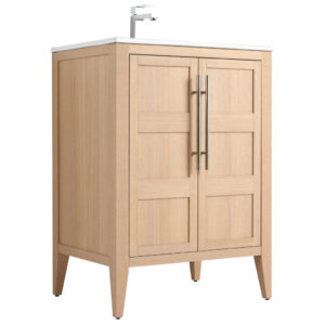 The Leafside 24 Inch Bathroom Vanity With Sink features an oak-colored finish, white countertop, sleek modern faucet, two paneled doors with vertical metal handles, and stands on four tapered legs, creating a simple yet elegant design.