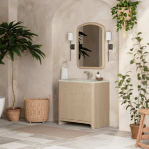 A minimalist bathroom showcases the Gracyn 36 inch Bathroom Vanity with a rectangular mirror and two wall sconces. Potted plants, a wicker basket, and a tiled floor bring natural accents to the neutral space, while a hanging plant adds greenery from above.