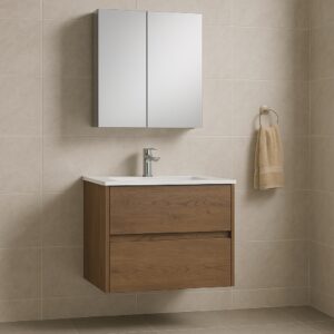 A modern bathroom with beige tiled walls, an Assisi 24 inch Wall Mounted Bathroom Vanity With Sink in wood featuring two drawers, a white countertop and sink, a wall-mounted mirror cabinet above, and a beige towel on a gold ring to the right.