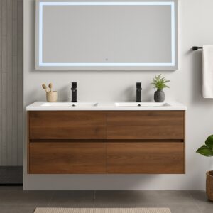 Modern bathroom with Assisi Wall Mounted Double Bathroom Vanity With Sink, four drawers, double sinks with black faucets, a large illuminated mirror above, a towel on a black bar, and a green plant on the floor.