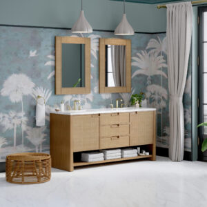 A stylish bathroom with a Solene 72 inch Double Bathroom Vanity Cabinet, dual mirrors, gold fixtures, pendant lights, tropical palm wallpaper, a woven basket stool, light curtains framing a tall window, and towels stored below the sink.