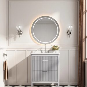 A stylish bathroom with black-and-white checkered floor, white wainscoting, a round backlit mirror above an Aveline 30 Inch Freestanding Bathroom Vanity With Top, flanked by wall sconces, a towel ring, and a large window with brown curtains.