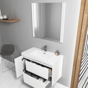 A modern bathroom showcases the Valencia 36 inch Wall Mount Vanity With Sink with open drawers and displayed toiletries, topped by a large mirror. On the left, there’s a gray chair, wood shelf with decor, and gray-and-white walls.