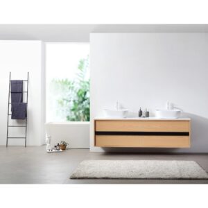 Modern minimalist bathroom featuring the Sintra 72 Inch Wall Mount Vanity with Double Vessel Sinks, a white countertop, gray floors, a shaggy rug, black towel ladder with folded towels, and a window showcasing natural light and greenery.