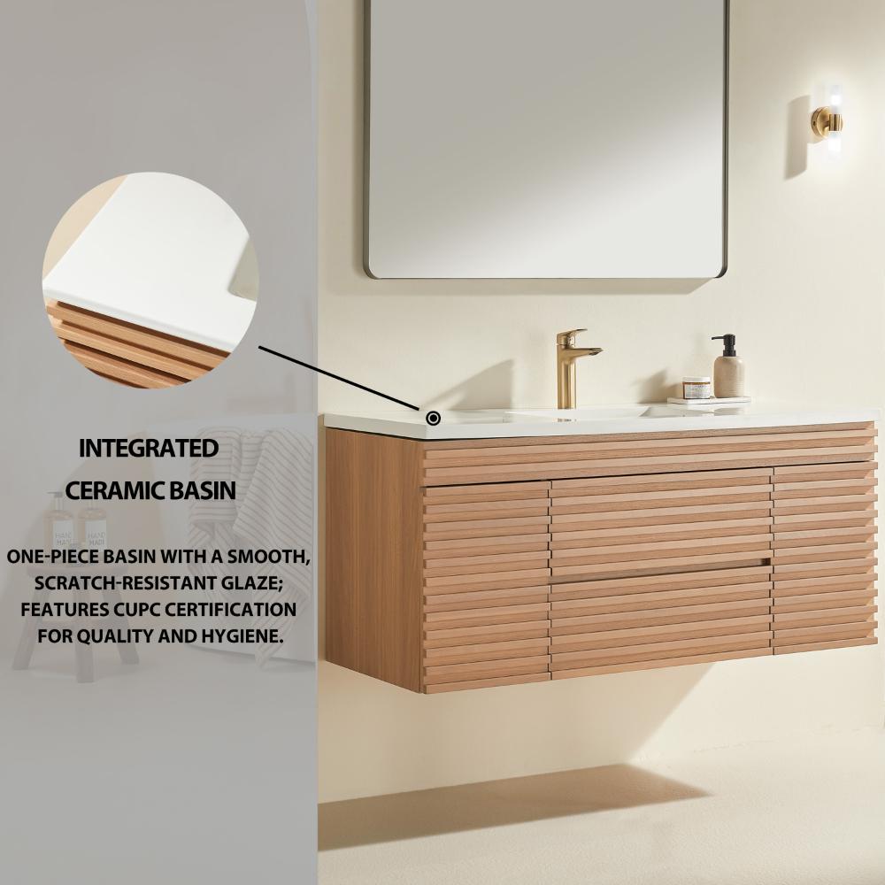 The Linea 48 Inch Wall Mounted Bathroom Vanity includes a strip front design cabinet, integrated white ceramic basin with scratch-resistant glaze, gold faucet, mirror, and light fixture.
