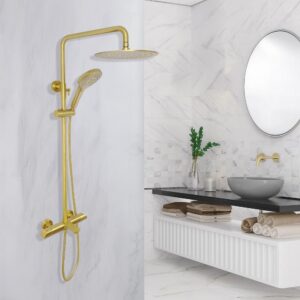 A modern bathroom with white marble walls, a gold shower fixture with a rain showerhead and handheld attachment, an oval mirror, gray vessel sink, gold faucet, and neatly folded towels on a countertop.